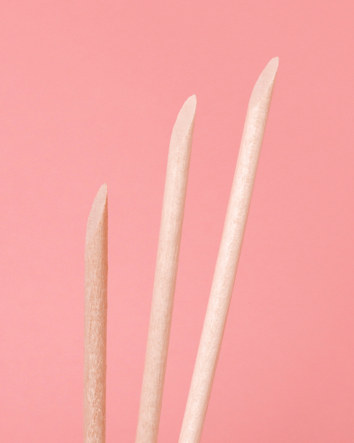 Premium Wax Sticks on a pink background