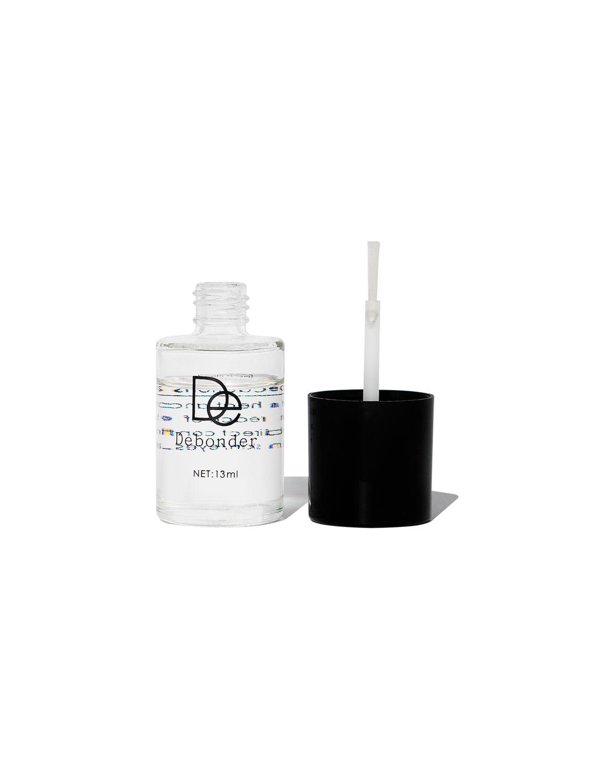 Adhesive Debonder bottle, open with the brush